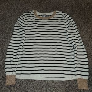 Striped black and white sweater.